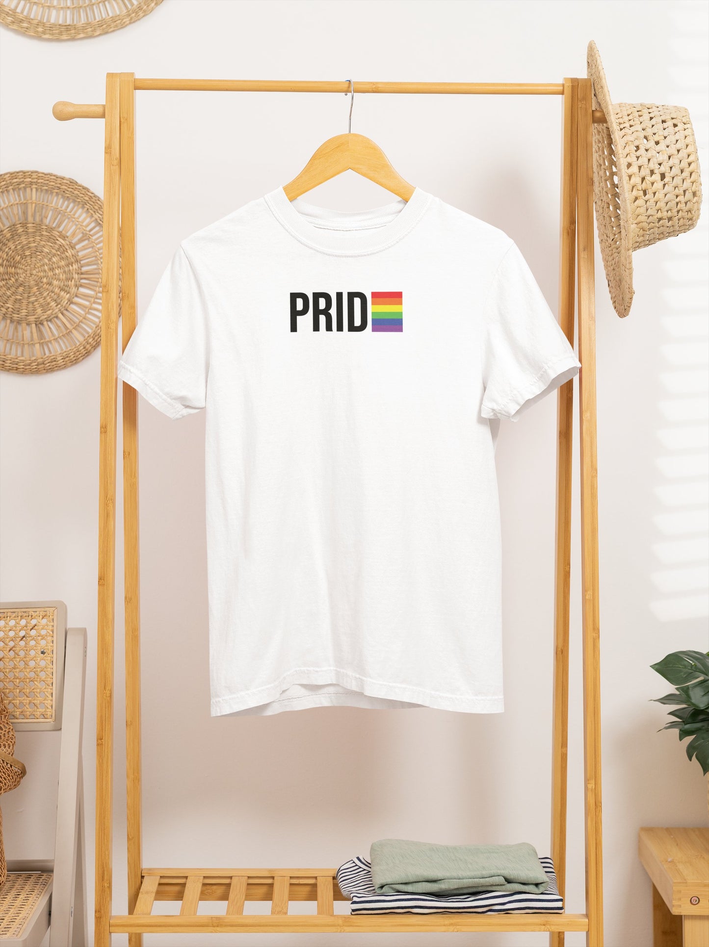 PRIDE Boricua Black Tee – Man in Office Wearing LGBTQ Rainbow Shirt Puerto Rico Style