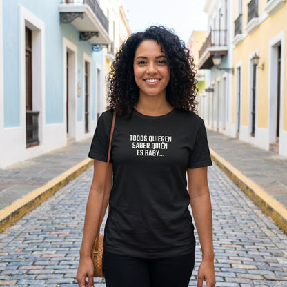 Woman wearing Quién es Baby bilingual black tee — unisex fit, Puerto Rico streetwear designed by Abimael Medina.